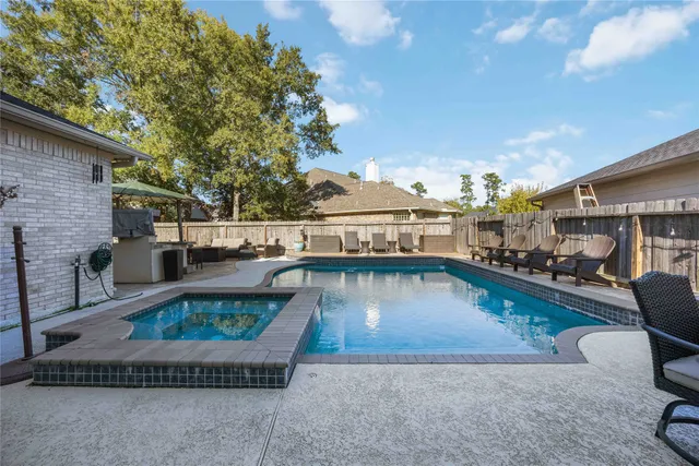 swimming pool with outdoor seating