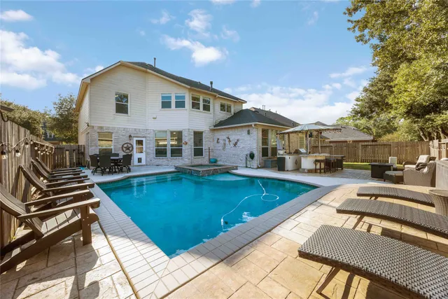 a table and chairs in a patio
