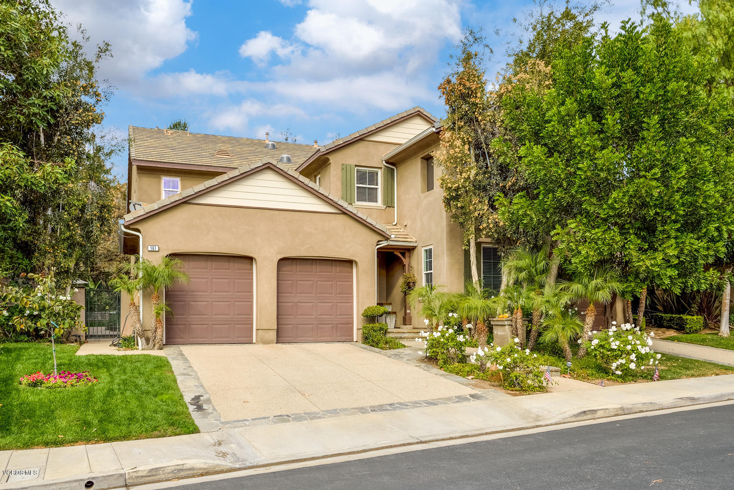 161 Laurel Ridge Drive Simi Valley, CA 93065 - Photo 1 of 50 a front view of a house with a garden