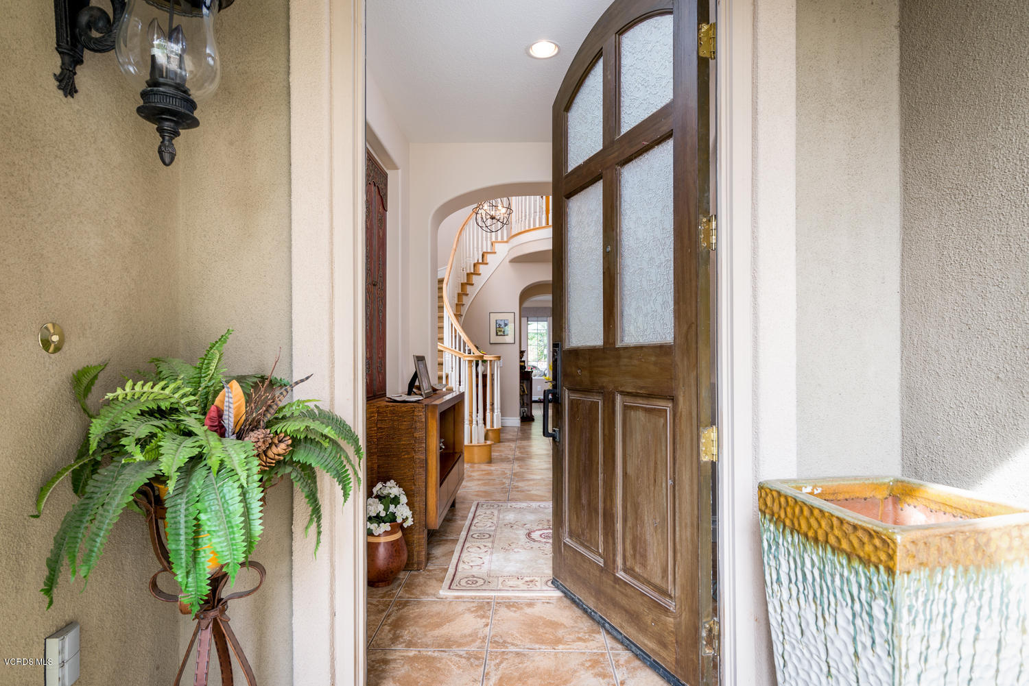 161 Laurel Ridge Drive Simi Valley, CA 93065 - Photo 11 of 50 a view of a hallway with wooden floor and stairs