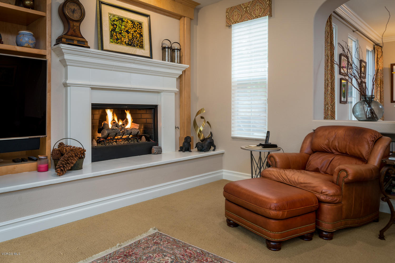 161 Laurel Ridge Drive Simi Valley, CA 93065 - Photo 18 of 50 a living room with furniture and a fireplace