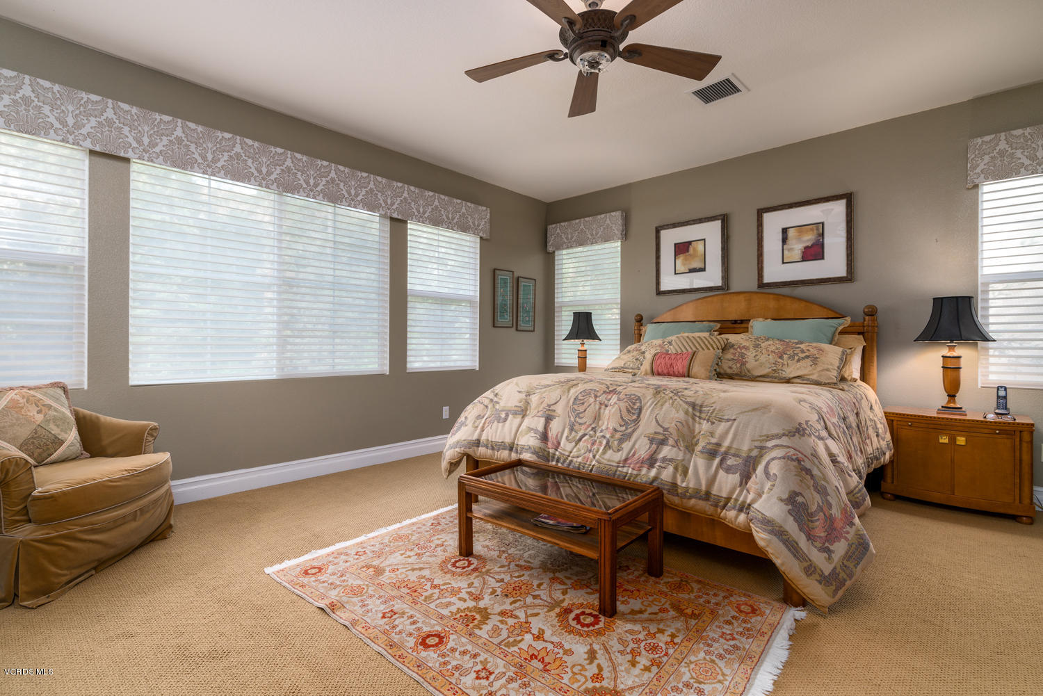 161 Laurel Ridge Drive Simi Valley, CA 93065 - Photo 27 of 50 a spacious bedroom with a bed and a couch