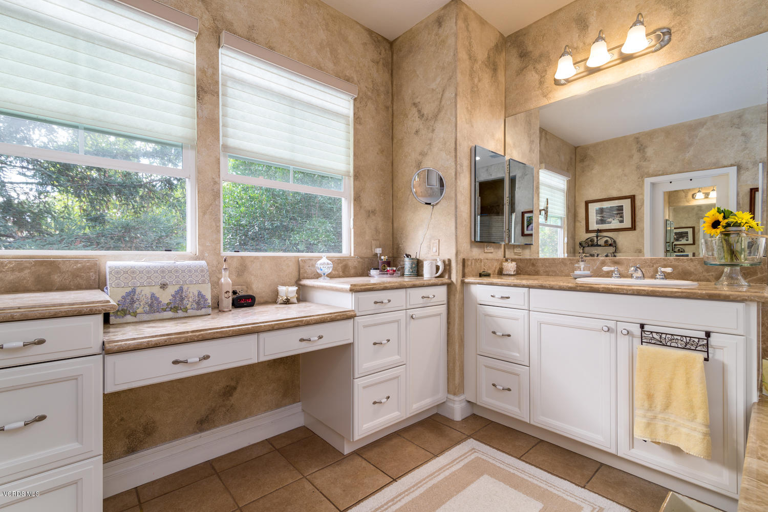 161 Laurel Ridge Drive Simi Valley, CA 93065 - Photo 33 of 50 a spacious bathroom with a double vanity sink a mirror and a bathtub
