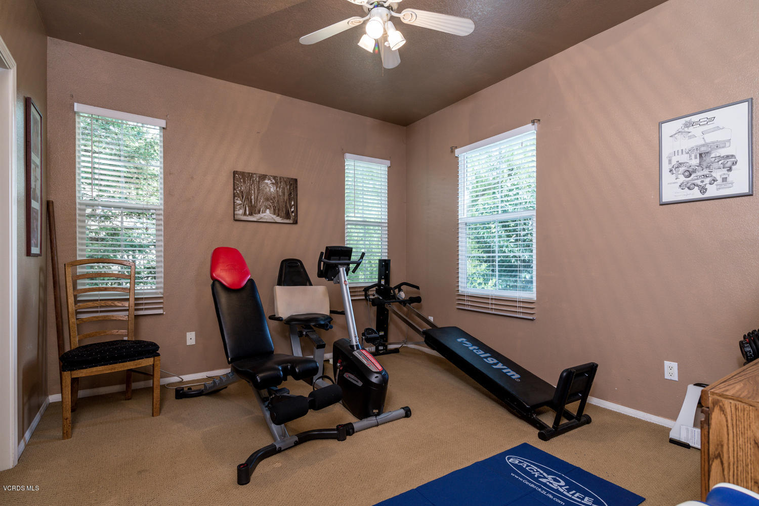 161 Laurel Ridge Drive Simi Valley, CA 93065 - Photo 37 of 50 a view of a room with gym equipment and a window