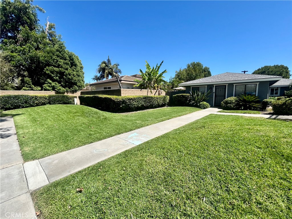2145 North Orange Olive Road Orange, CA 92865 - Photo 1 of 43 Private Entry with large greenbelt in your front yard.