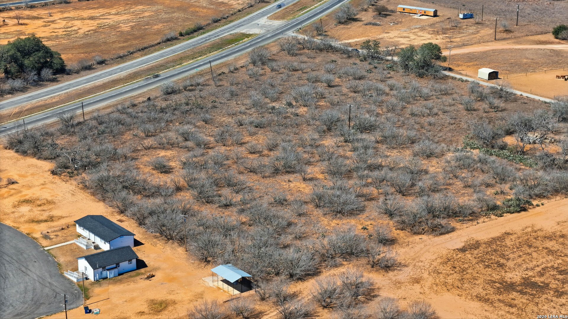 Tbd Duncan Pleasanton, TX 78064 - Photo 12 of 12 a view of a yard with wooden fence