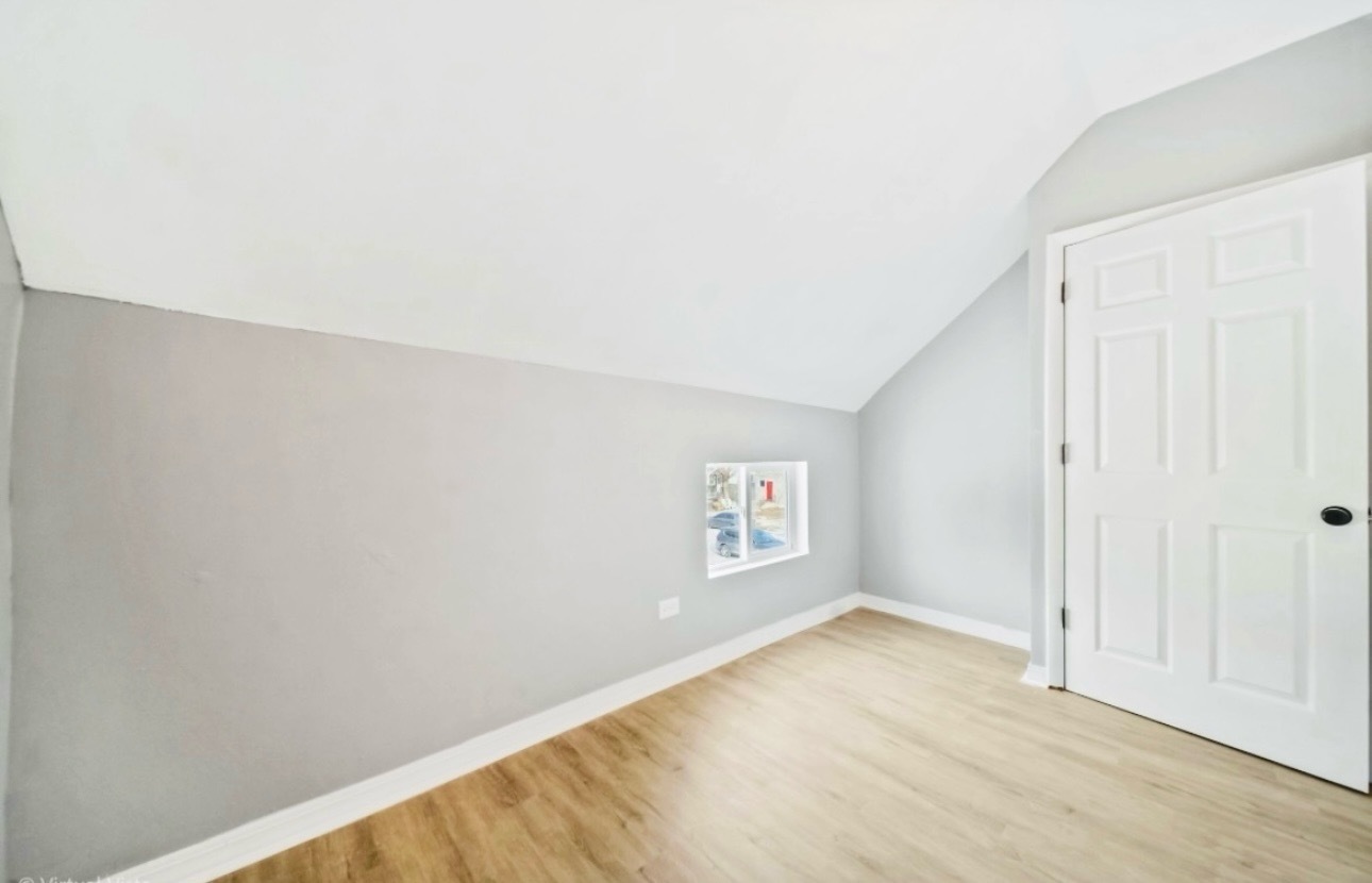 1216 Park Avenue, Unit 1 Chicago Heights, IL 60411 - Photo 8 of 10 a view of an empty room