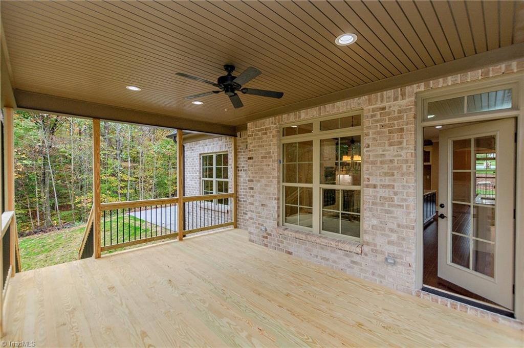 8204 Southerland Drive Browns Summit, NC 27214 - Photo 17 of 23 Covered Porch