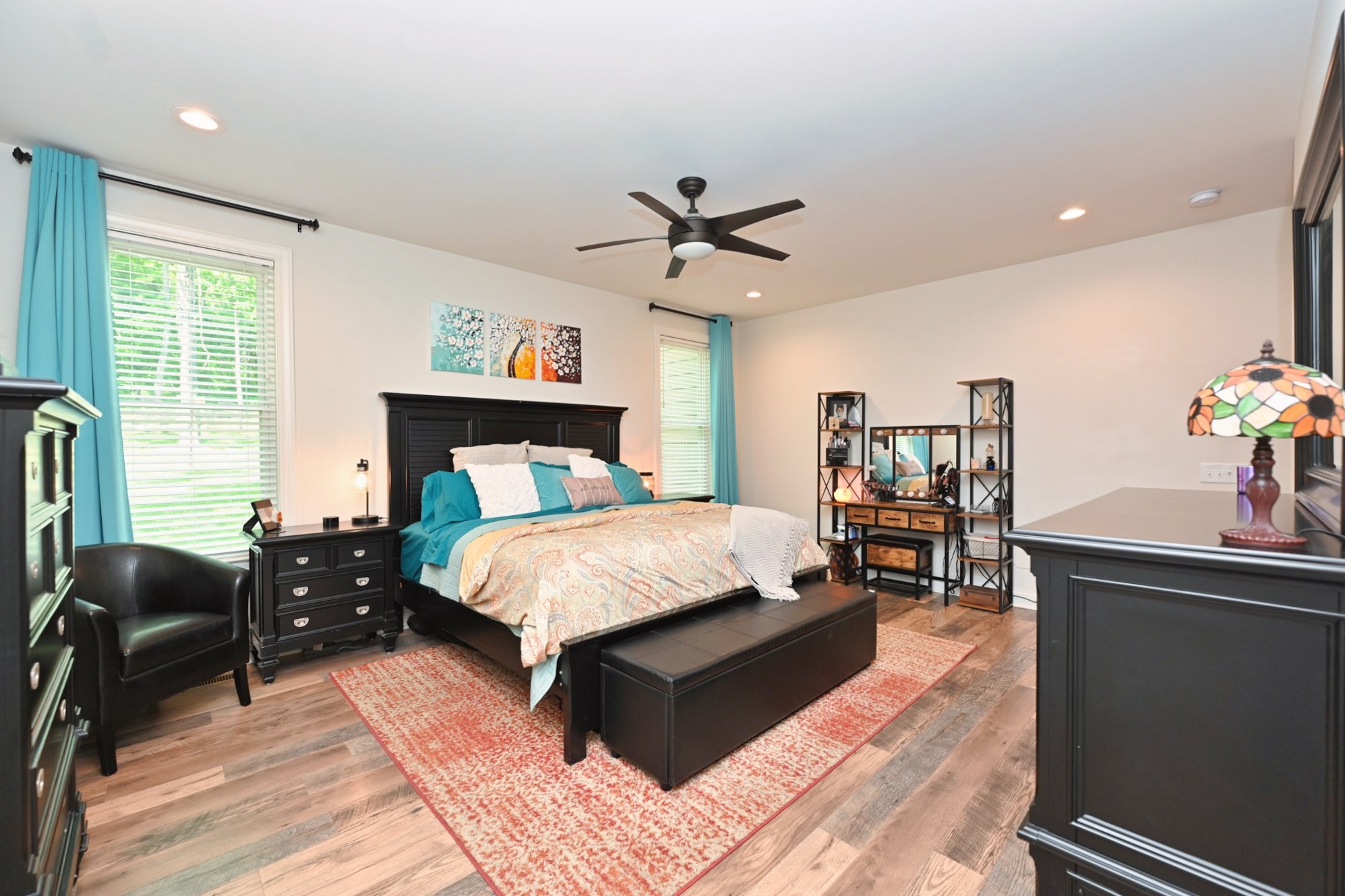 632 Weeping Willow Road Hendersonville, TN 37075 - Photo 17 of 42 a bedroom with a bed and wooden floor