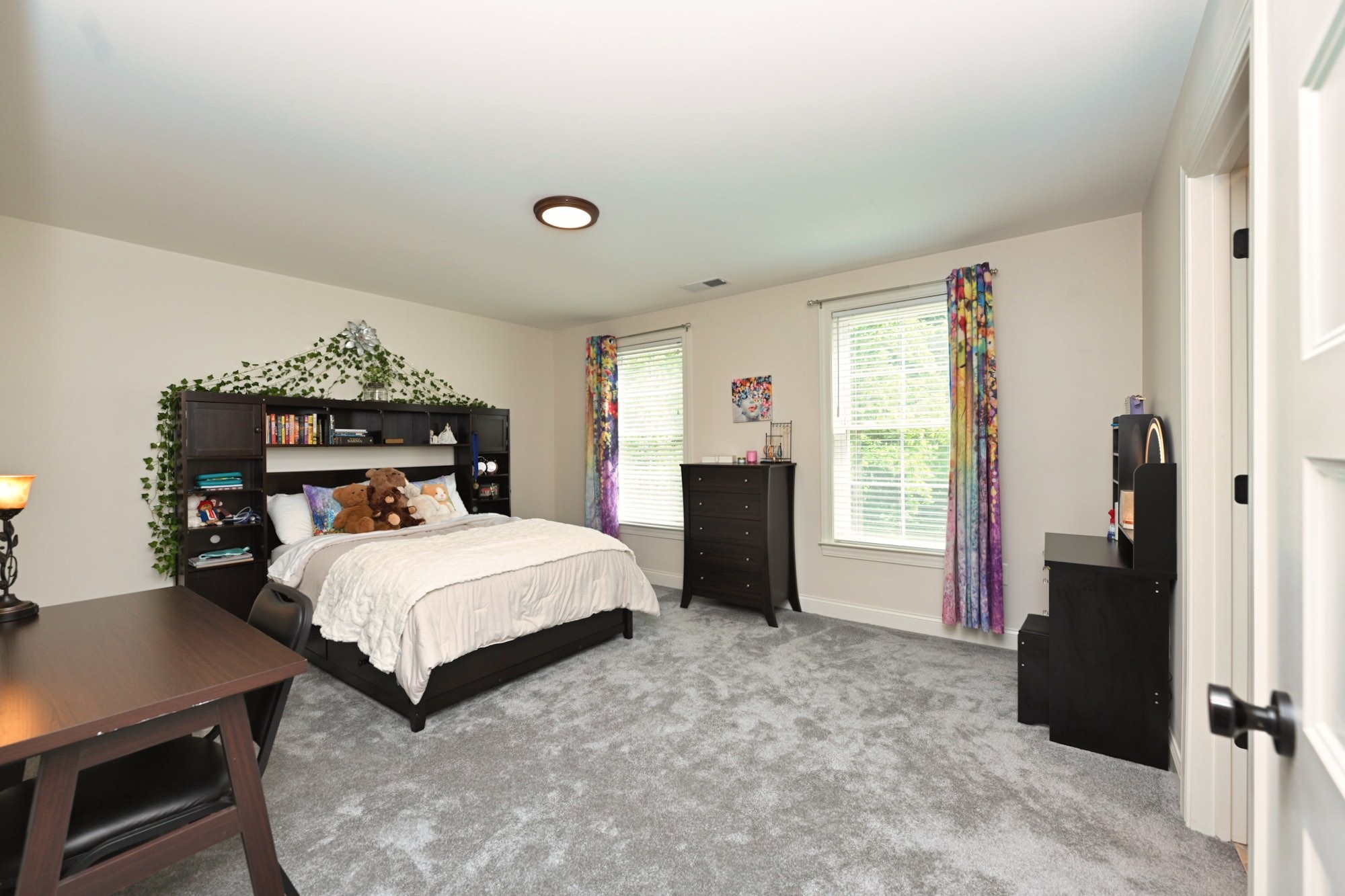632 Weeping Willow Road Hendersonville, TN 37075 - Photo 20 of 42 a bedroom with a bed and a refrigerator