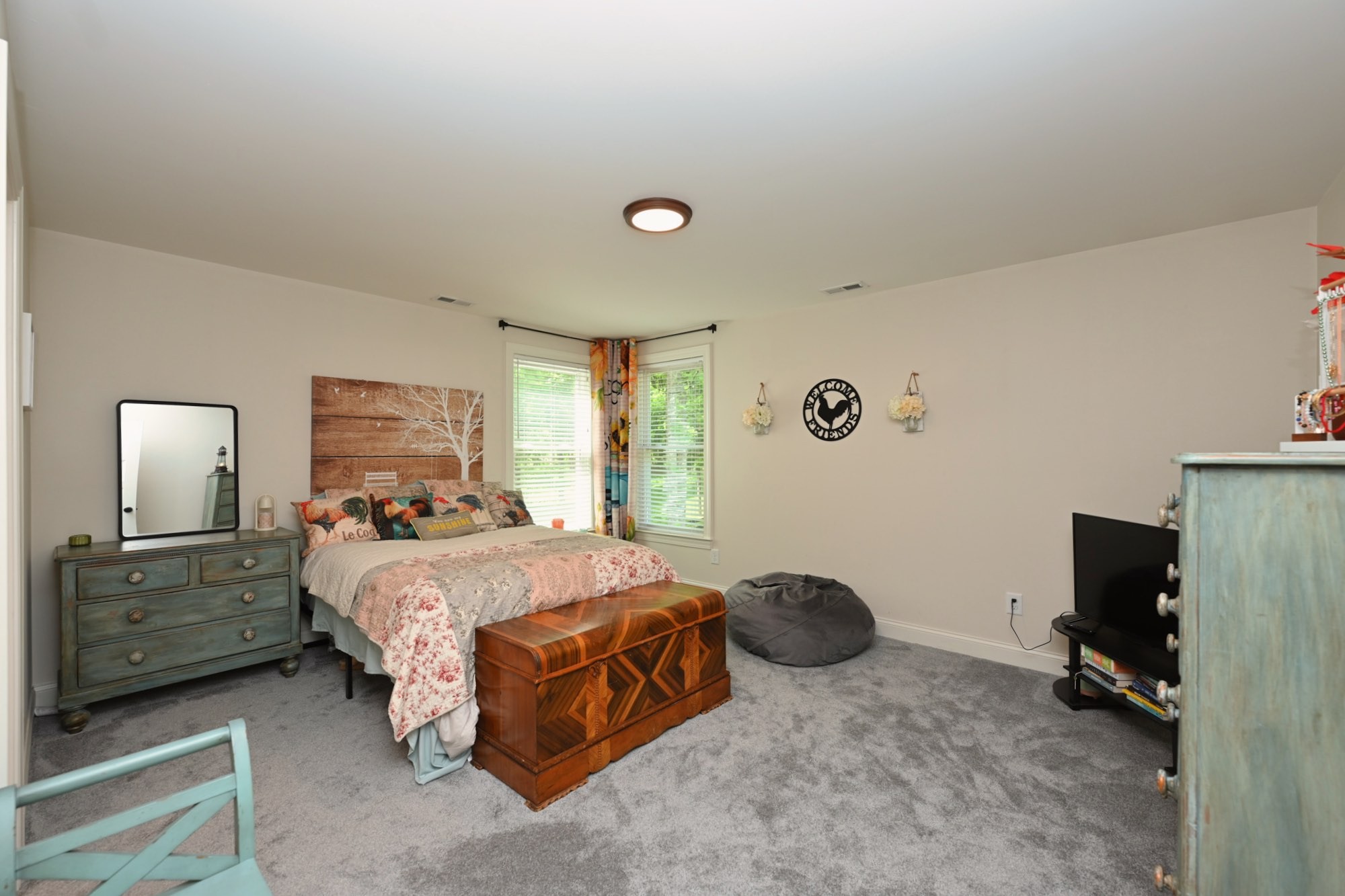 632 Weeping Willow Road Hendersonville, TN 37075 - Photo 24 of 42 a bedroom with a bed and a tv on the dresser