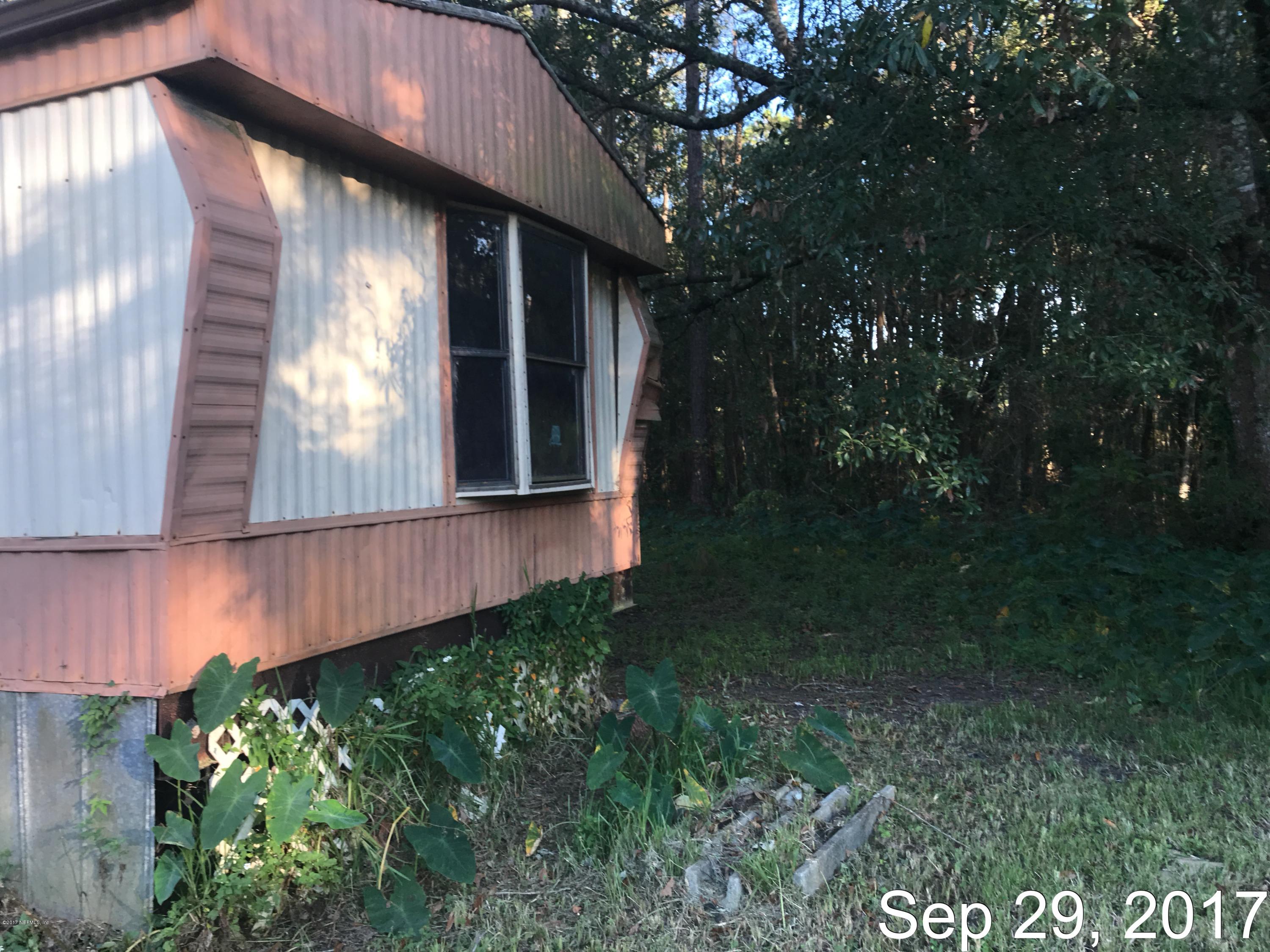 6324 Mockingbird Road Jacksonville, FL 32219 - Photo 4 of 16 IMG_1883