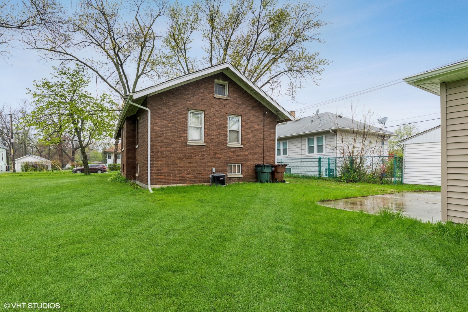 16703 Lincoln Street Hazel Crest, IL 60429 - Photo 13 of 16 a front view of house with yard and green space