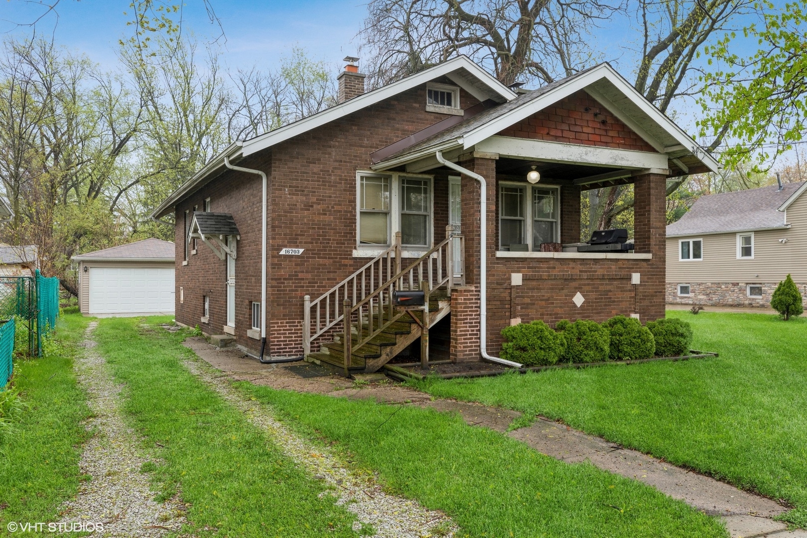 16703 Lincoln Street Hazel Crest, IL 60429 - Photo 3 of 16 a view of a house with a yard and pathway