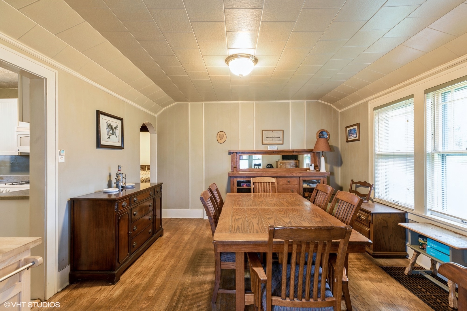 16703 Lincoln Street Hazel Crest, IL 60429 - Photo 8 of 16 a view of a dining room with furniture and a window