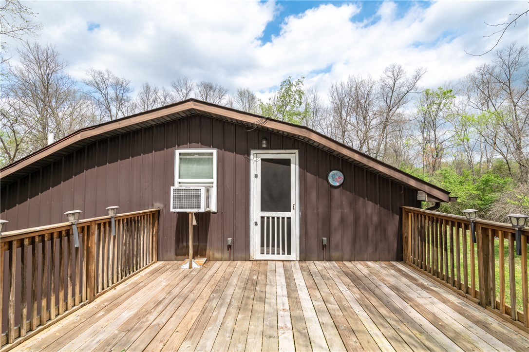 6750 Little Twin Road Germantown, OH 45327 - Photo 66 of 88 This charming home features a spacious deck, perfect for outdoor living and entertaining amidst nature.