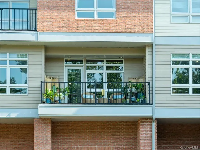 a view of a house with a large window