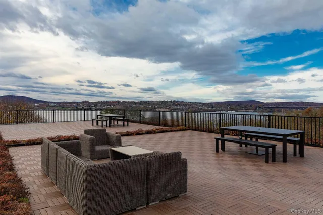 a view of a terrace with furniture