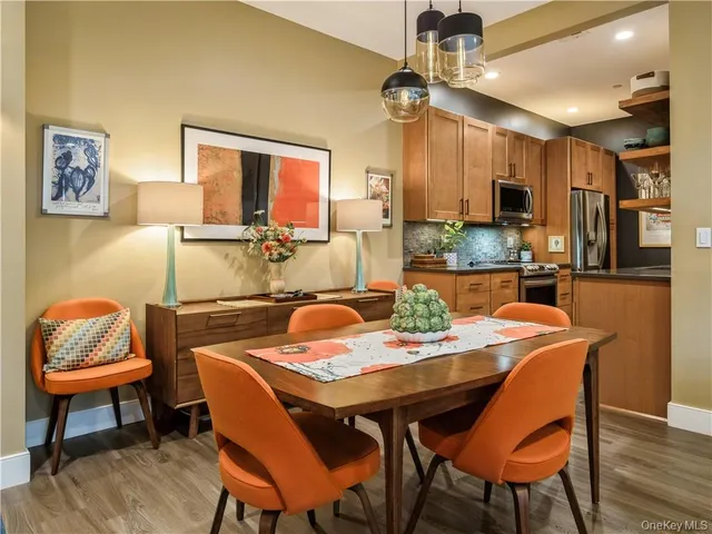 a view of a dining room with furniture