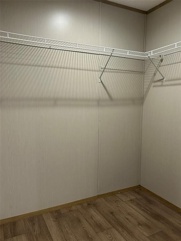 6443 Finance Avenue Weeki Wachee, FL 34607 - Photo 24 of 45 a view of a room with racks on the wall