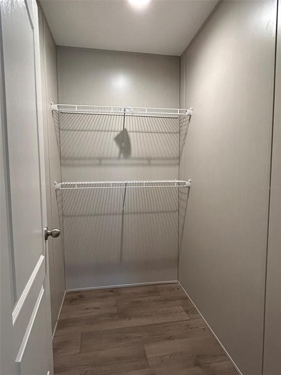 6443 Finance Avenue Weeki Wachee, FL 34607 - Photo 30 of 45 a view of storage and utility room with empty racks