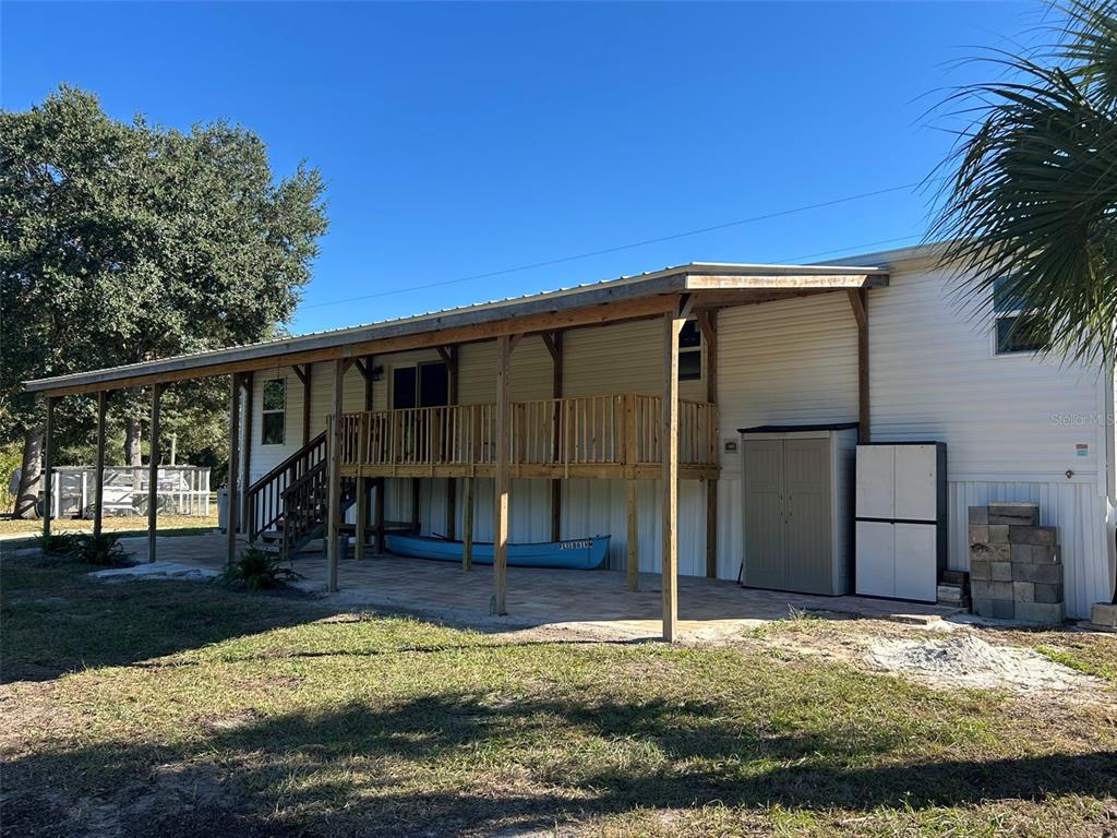 6443 Finance Avenue Weeki Wachee, FL 34607 - Photo 3 of 45 a view of house with yard