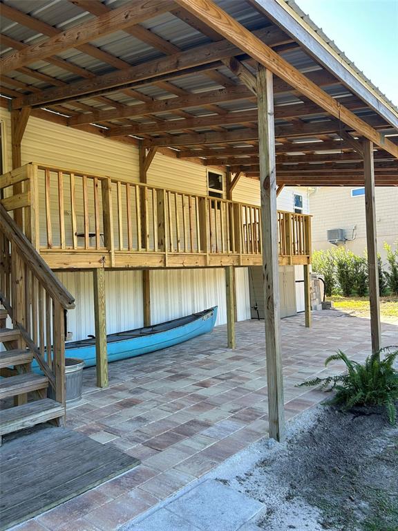6443 Finance Avenue Weeki Wachee, FL 34607 - Photo 32 of 45 a view of a porch