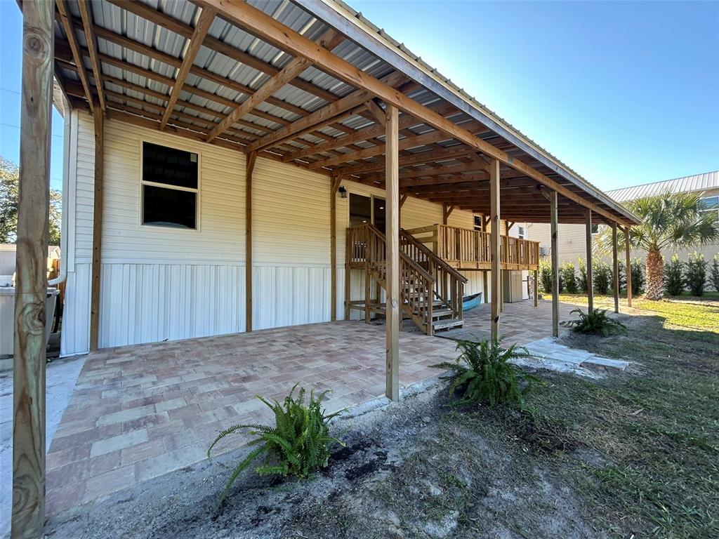 6443 Finance Avenue Weeki Wachee, FL 34607 - Photo 4 of 45 a view of a porch