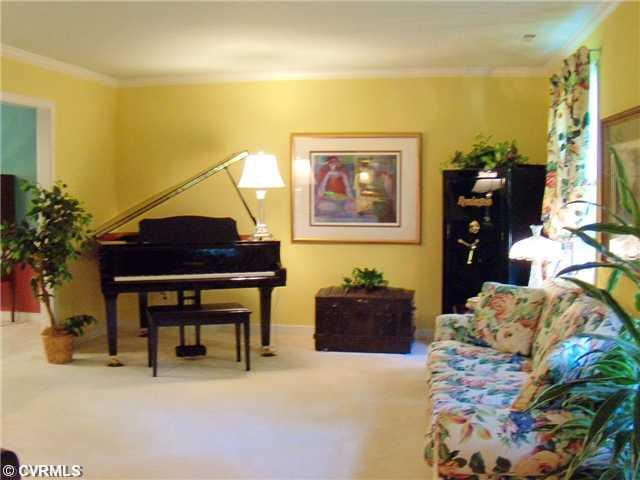10211 Delray Road Glen Allen, VA 23060 - Photo 2 of 12 Living Room - Formal living with new carpet and crown molding.