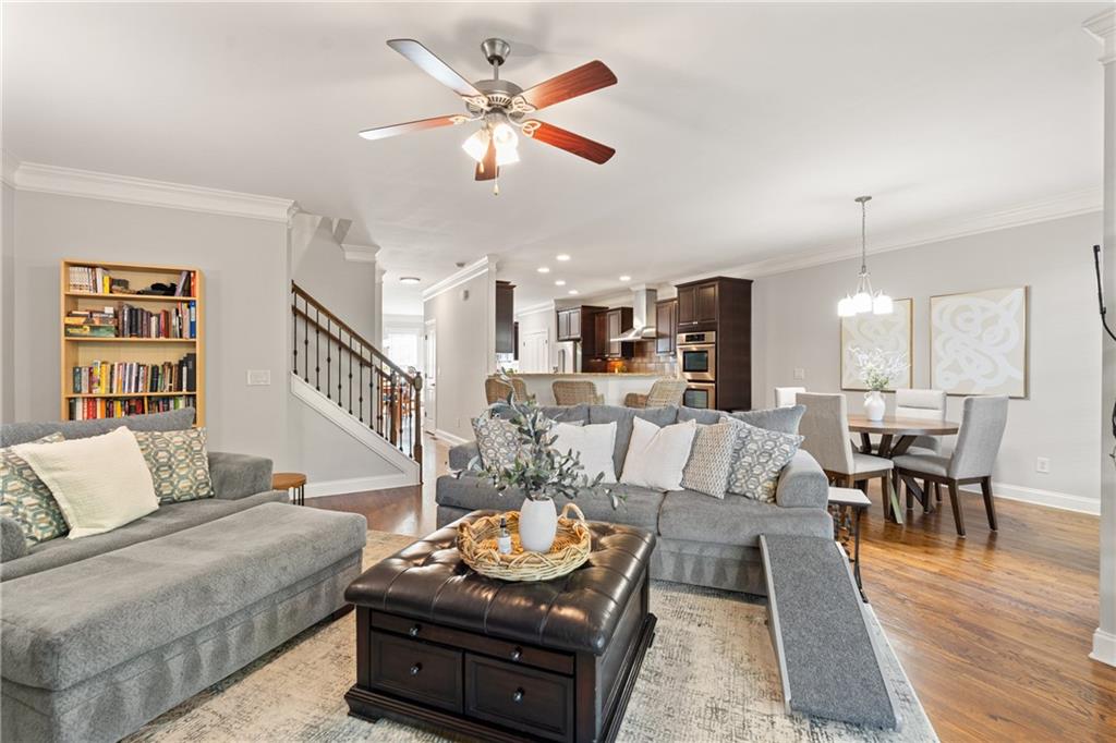 2015 Eagle Ridge Roswell, GA 30076 - Photo 2 of 47 a living room with furniture and wooden floor