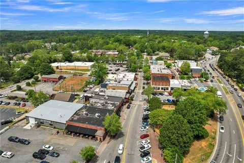 an aerial view of a houses with outdoor space