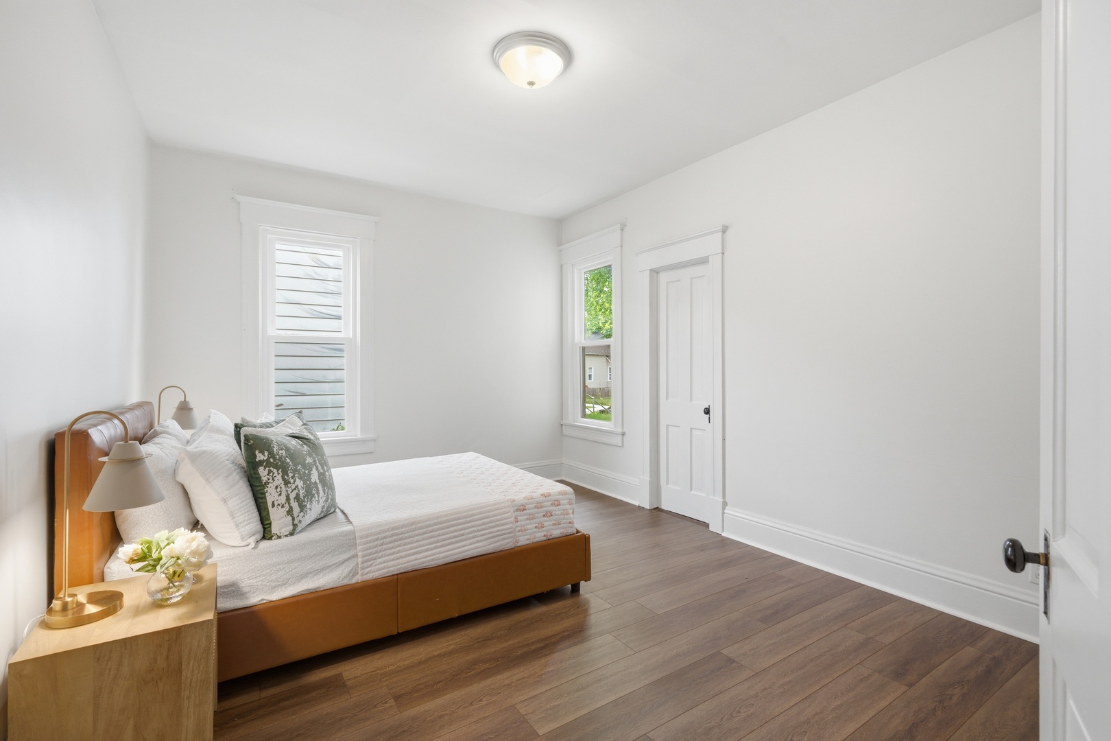 1847 10th Street Moline, IL 61265 - Photo 12 of 39 a bedroom with a bed and window