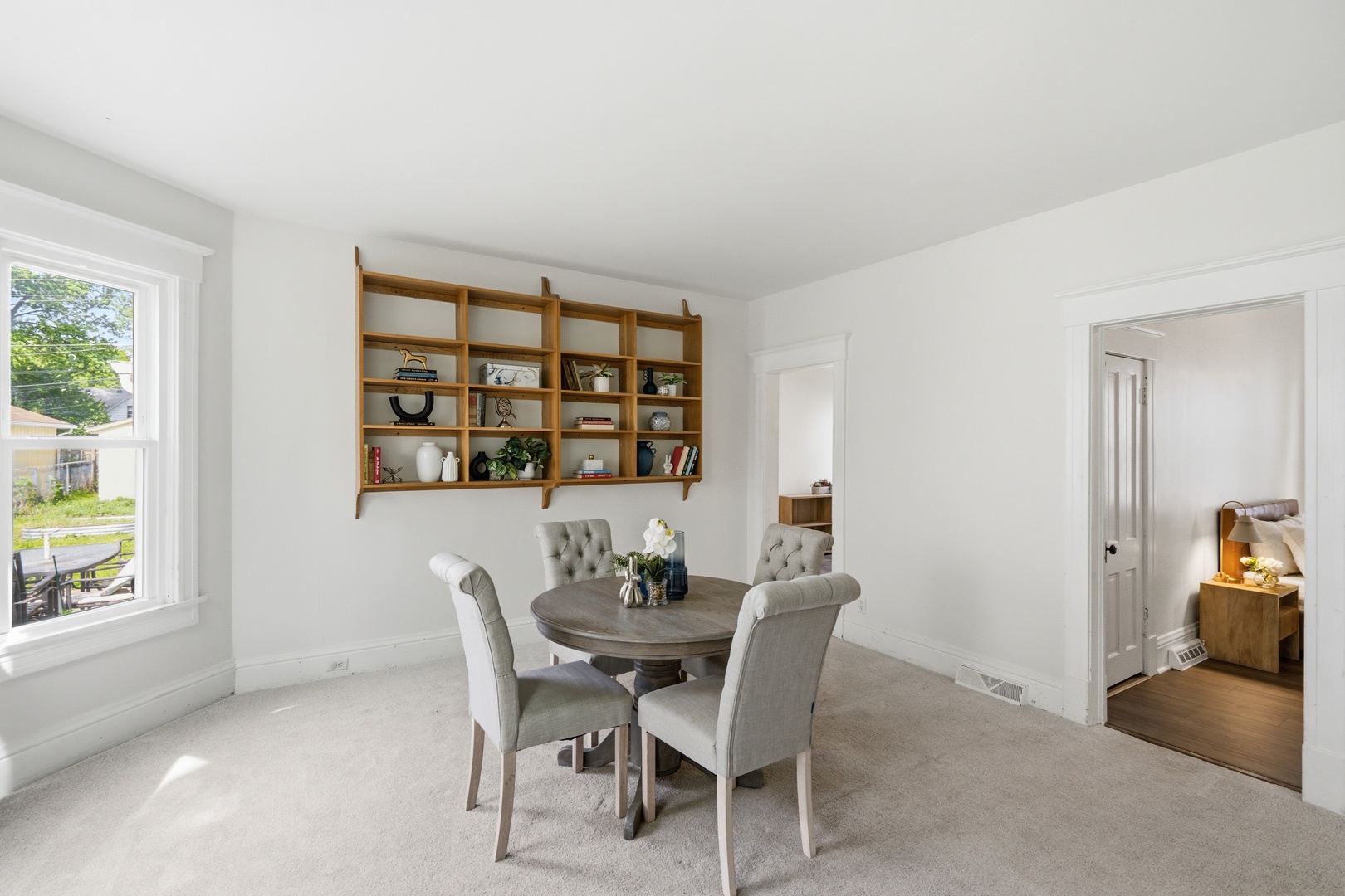 1847 10th Street Moline, IL 61265 - Photo 10 of 39 a dining room with furniture and window