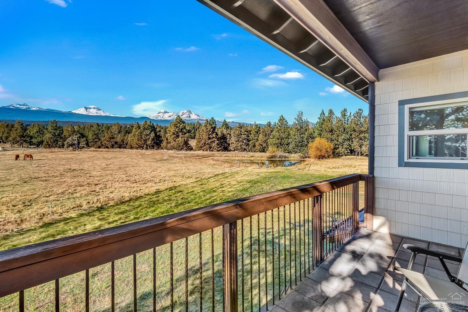 18865 Couch Market Road Bend, OR 97703 - Photo 9 of 25 Covered balcony off the master suite off