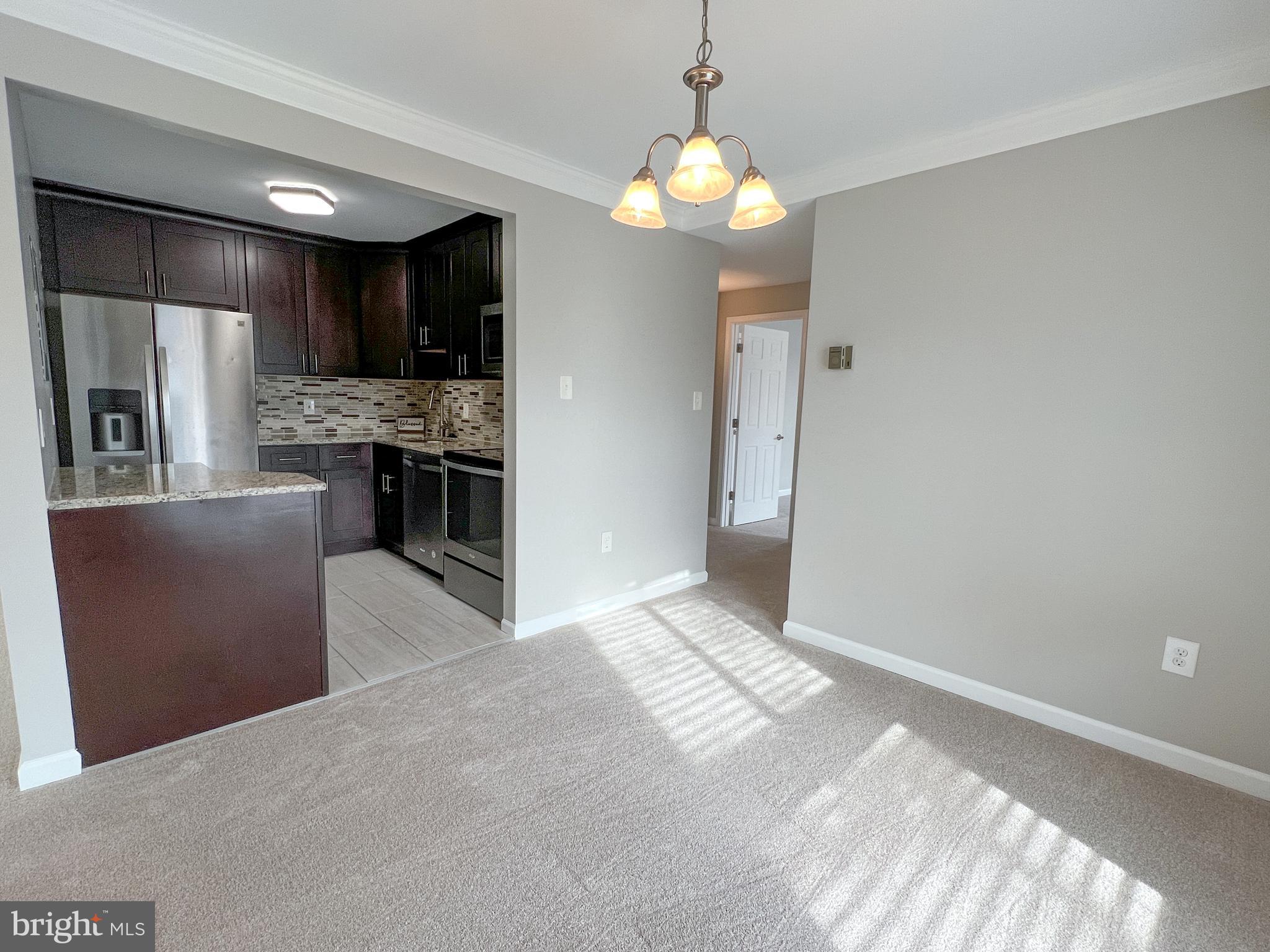 17804 Buehler Road, Unit 146 Olney, MD 20832 - Photo 12 of 31 Dining Room with View into Kitchen