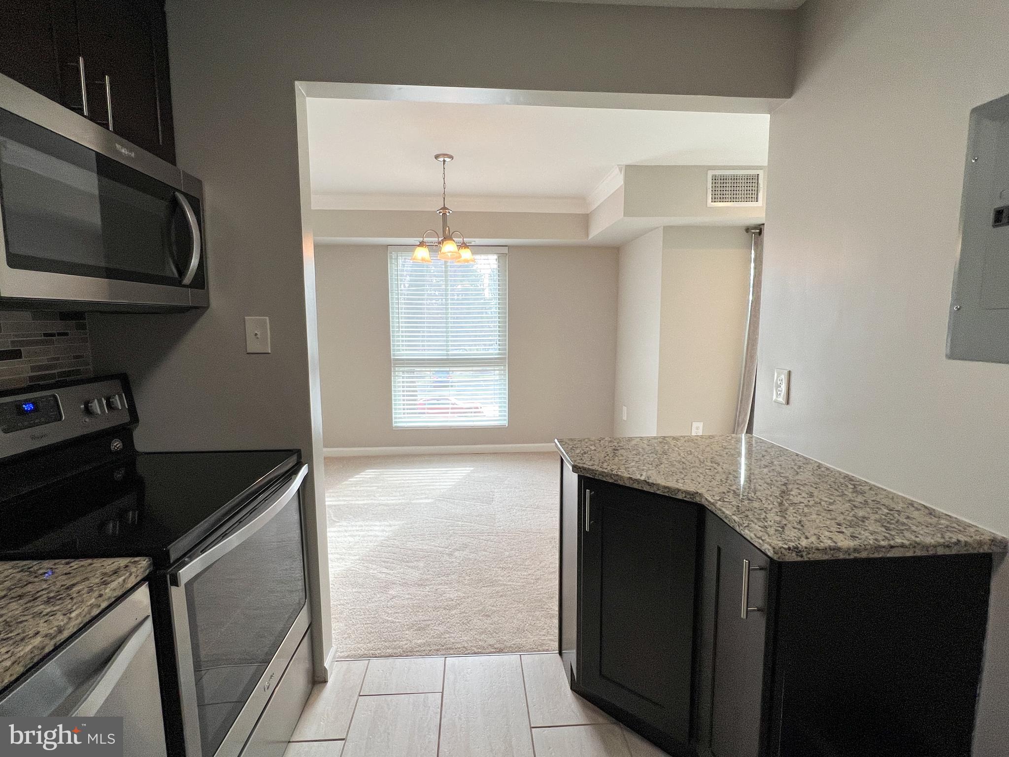 17804 Buehler Road, Unit 146 Olney, MD 20832 - Photo 18 of 31 Kitchen with view into Dining Room