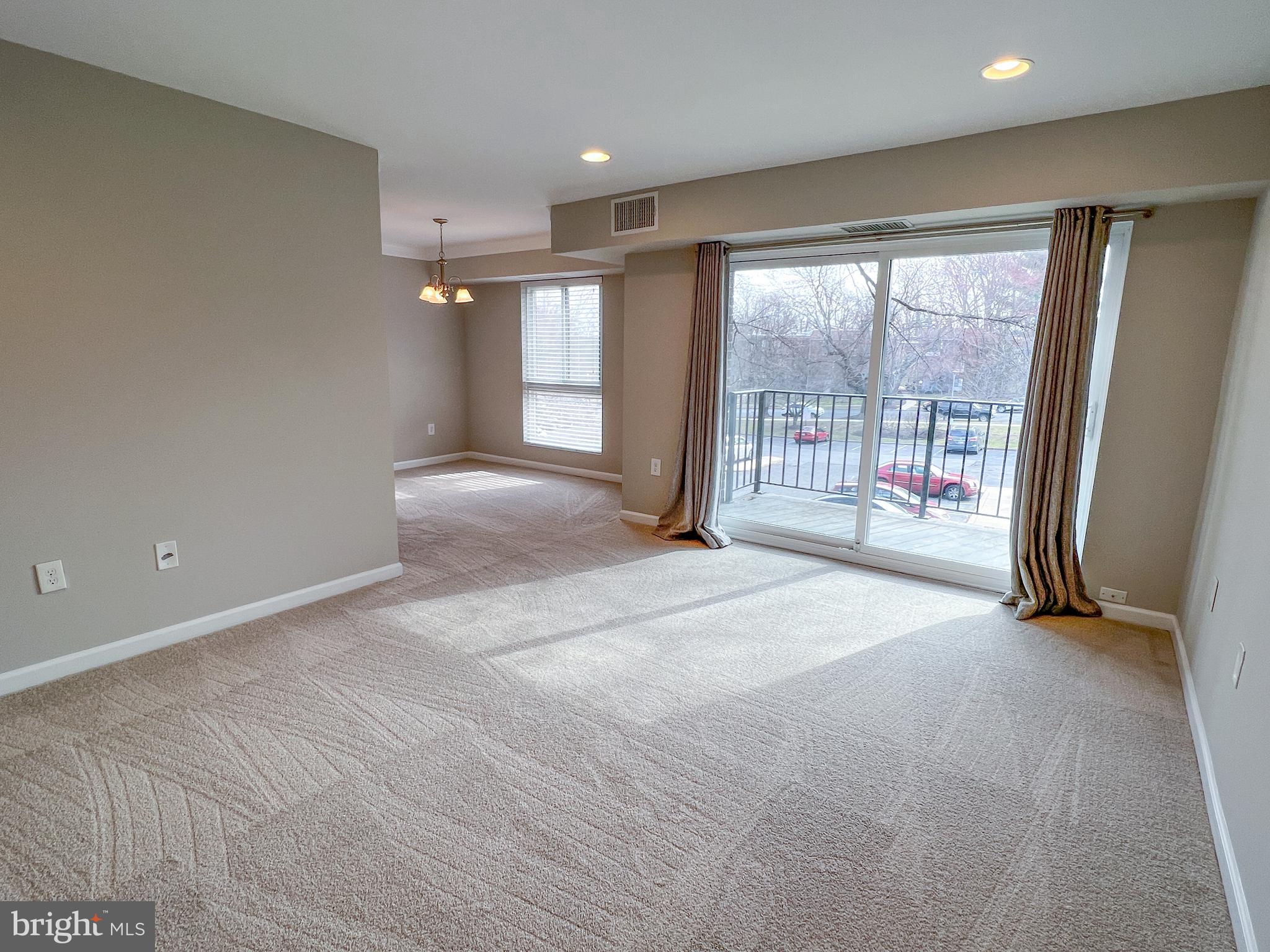 17804 Buehler Road, Unit 146 Olney, MD 20832 - Photo 5 of 31 Living Room with view to Balcony & Dining Room