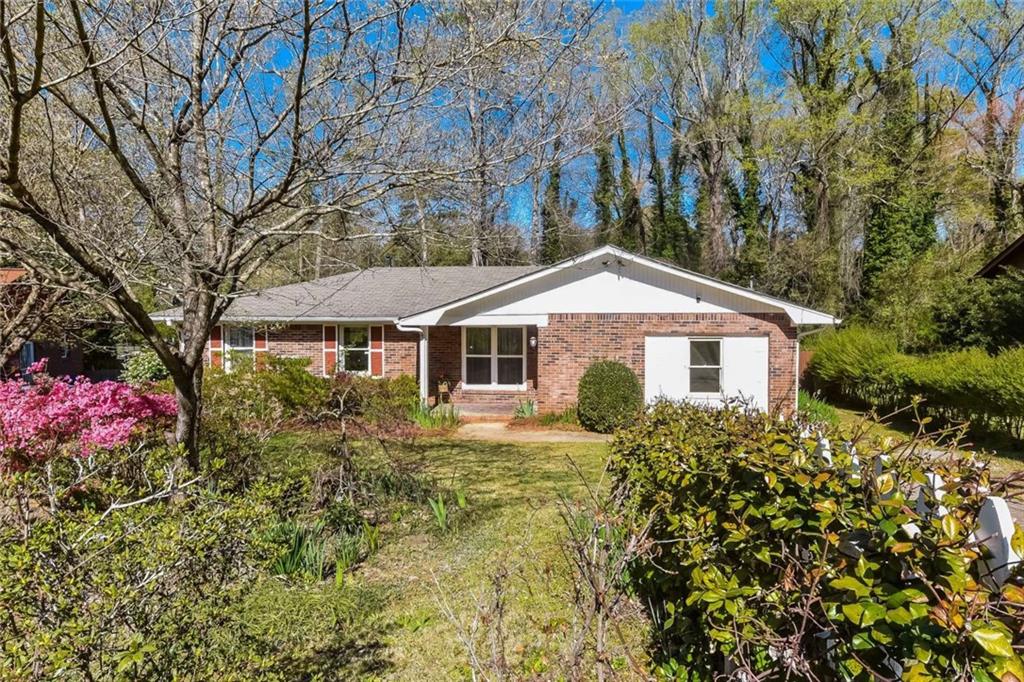 2326 North Eiffel Court Decatur, GA 30032 - Photo 1 of 1 a front view of house with yard and trees around