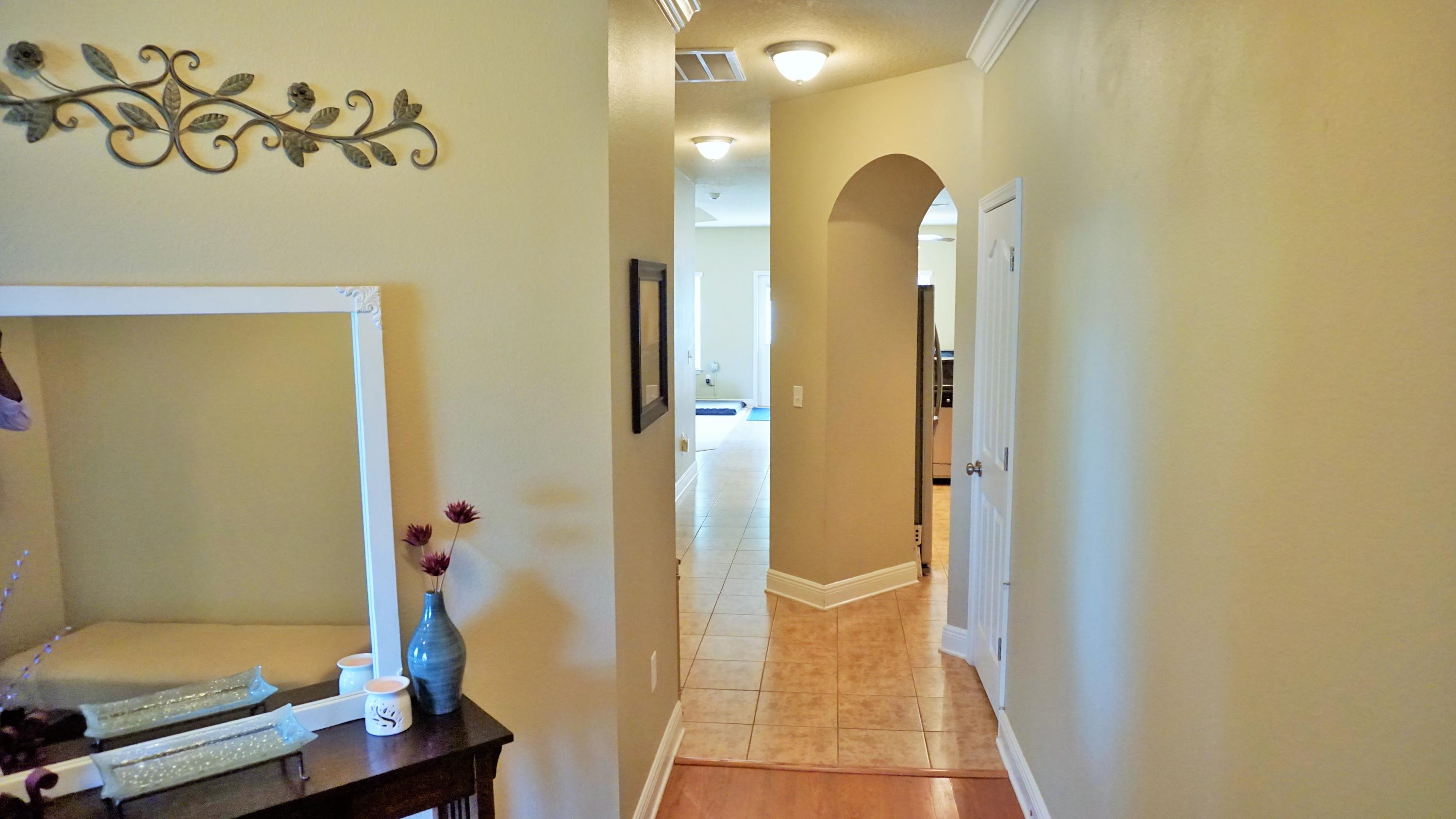 632 Red Fern Road Crestview, FL 32536 - Photo 4 of 36 a bathroom with a tub and shower