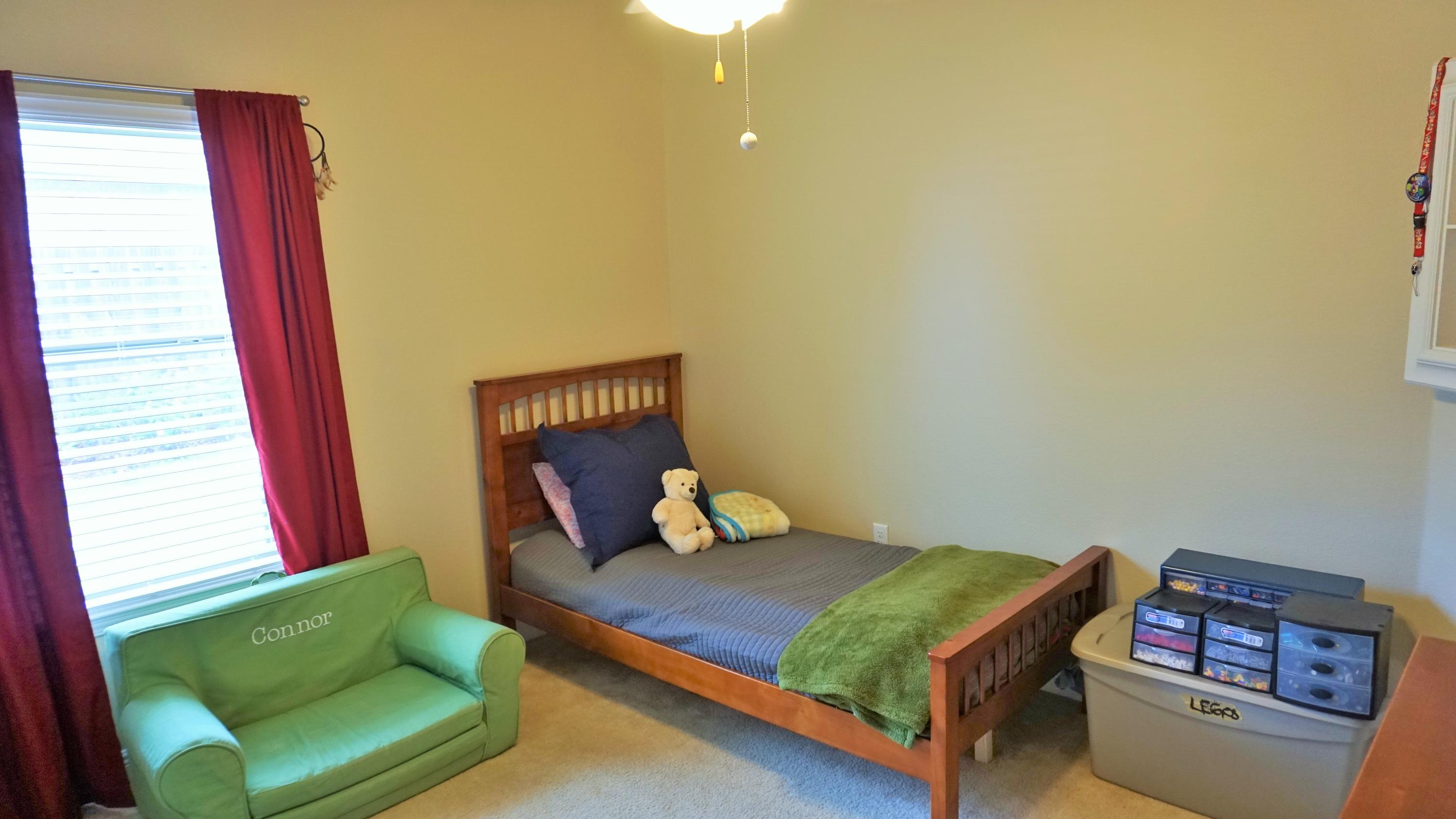 632 Red Fern Road Crestview, FL 32536 - Photo 31 of 36 a bedroom with a bed and window