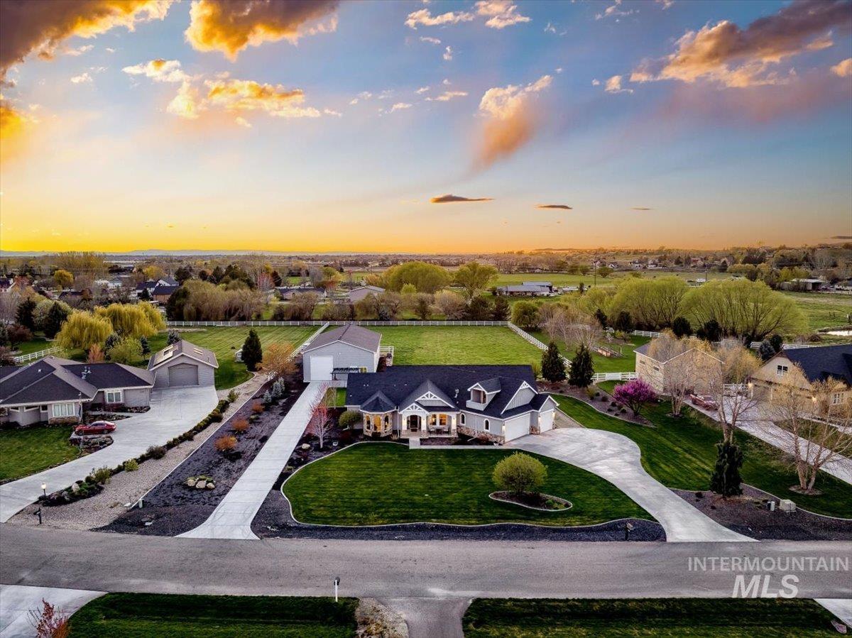 23553 New Castle Court Middleton, ID 83644 - Photo 1 of 1 Aerial view at dusk
