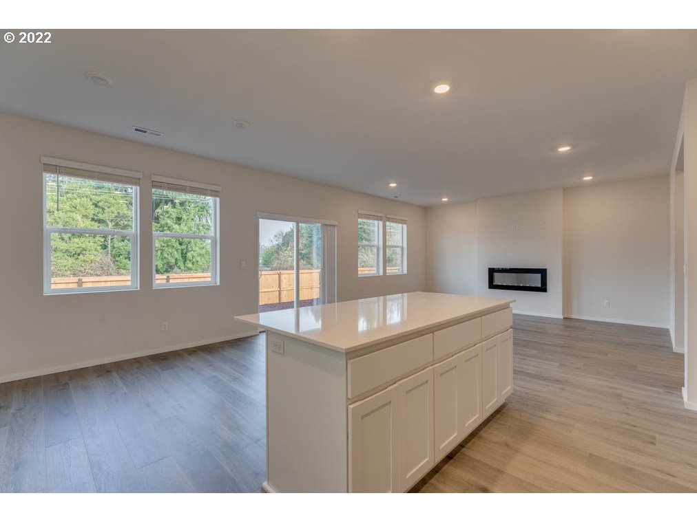 2928 V Street Springfield, OR 97477 - Photo 6 of 23 a living room with a couch and a wooden floor