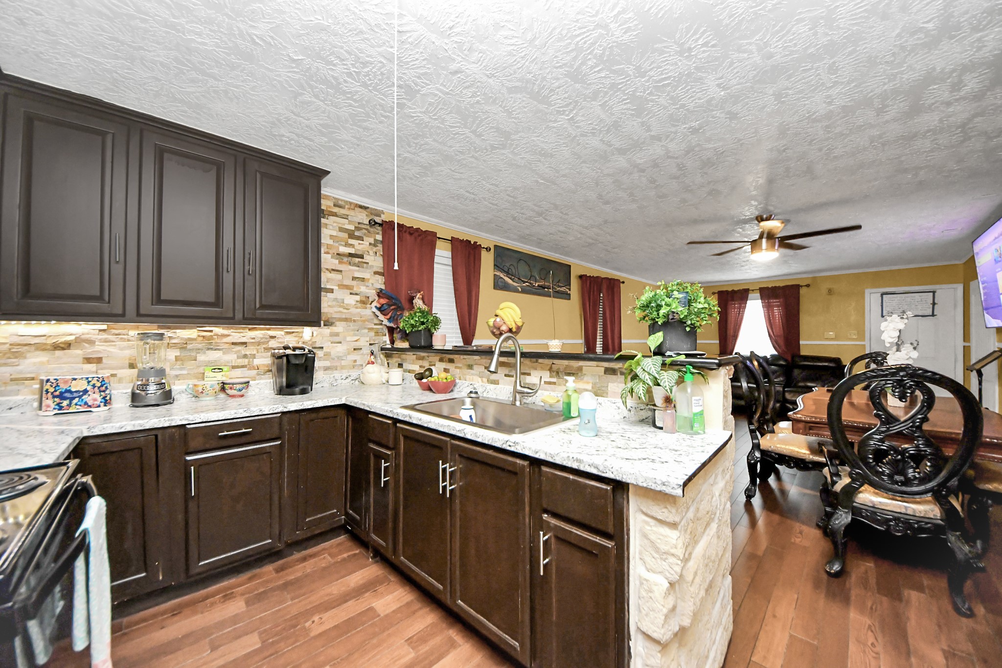 1040 County Road 5007 Cleveland, TX 77327 - Photo 12 of 47 a kitchen with lots of counter top space