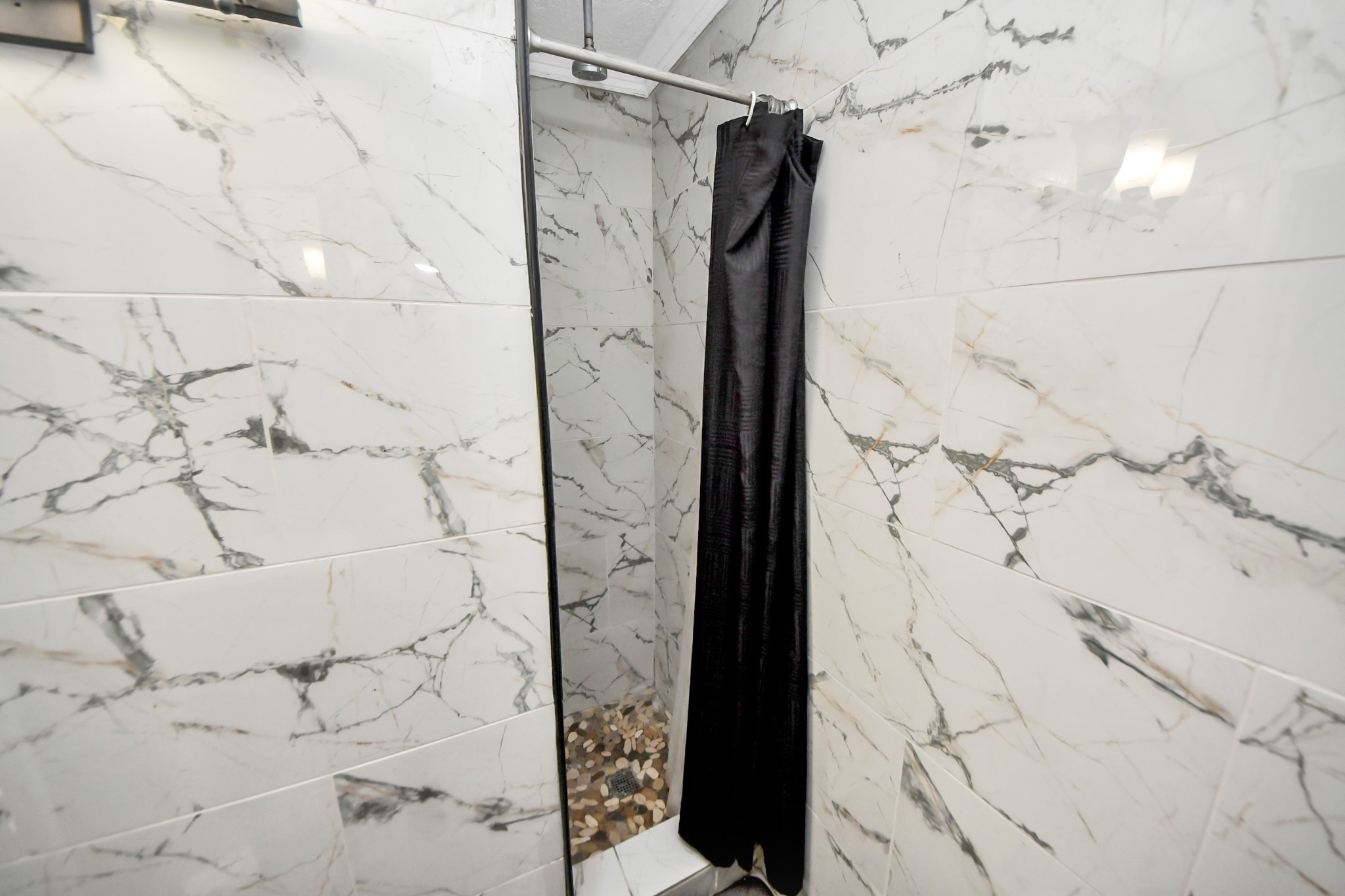 1040 County Road 5007 Cleveland, TX 77327 - Photo 28 of 47 a bathroom with shower