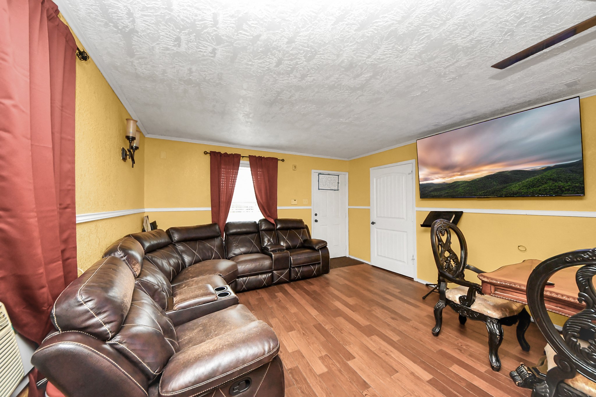 1040 County Road 5007 Cleveland, TX 77327 - Photo 6 of 47 a living room with furniture a rug and a window