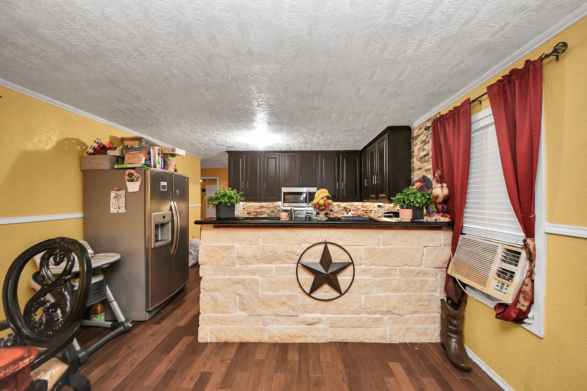 1040 County Road 5007 Cleveland, TX 77327 - Photo 9 of 47 a view of a entryway with wooden floor