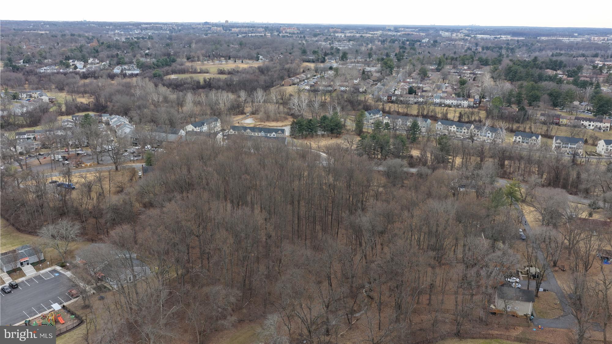9415 Stewartown Road Gaithersburg, MD 20879 - Photo 11 of 24 Rear view of lot w/ surrounding neighborhood