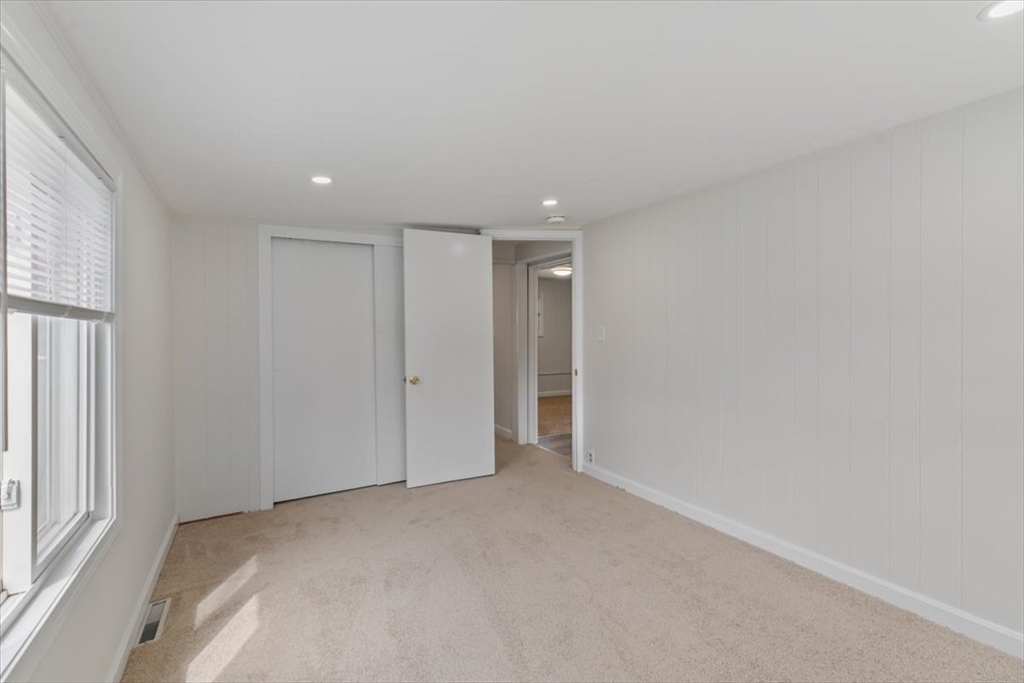 5 E Street Merrimac, MA 01860 - Photo 20 of 25 a view of an empty room and a window