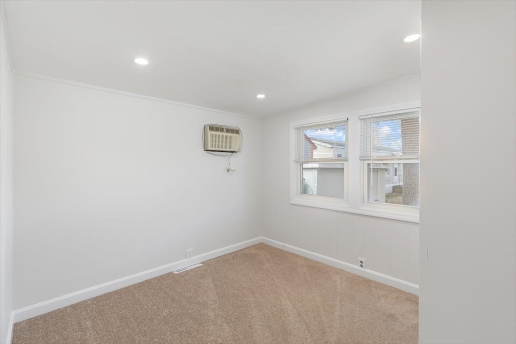 5 E Street Merrimac, MA 01860 - Photo 21 of 25 an empty room with windows