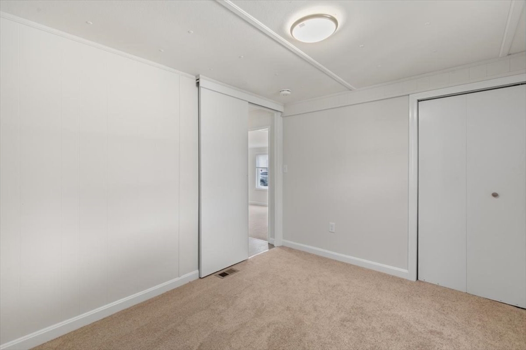 5 E Street Merrimac, MA 01860 - Photo 24 of 25 an empty room with an entryway
